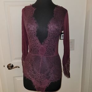 Size M burgundy body suit